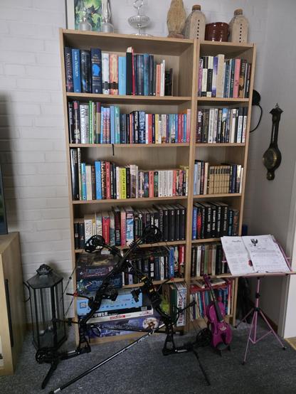A small bookshelf full of books.