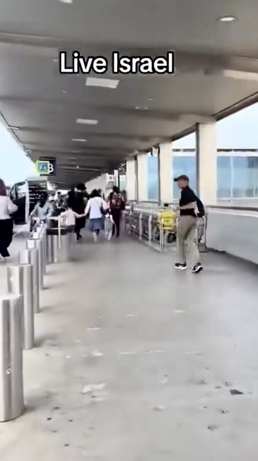 Live Israel - showing people running at the airport to leave the bombing behind.