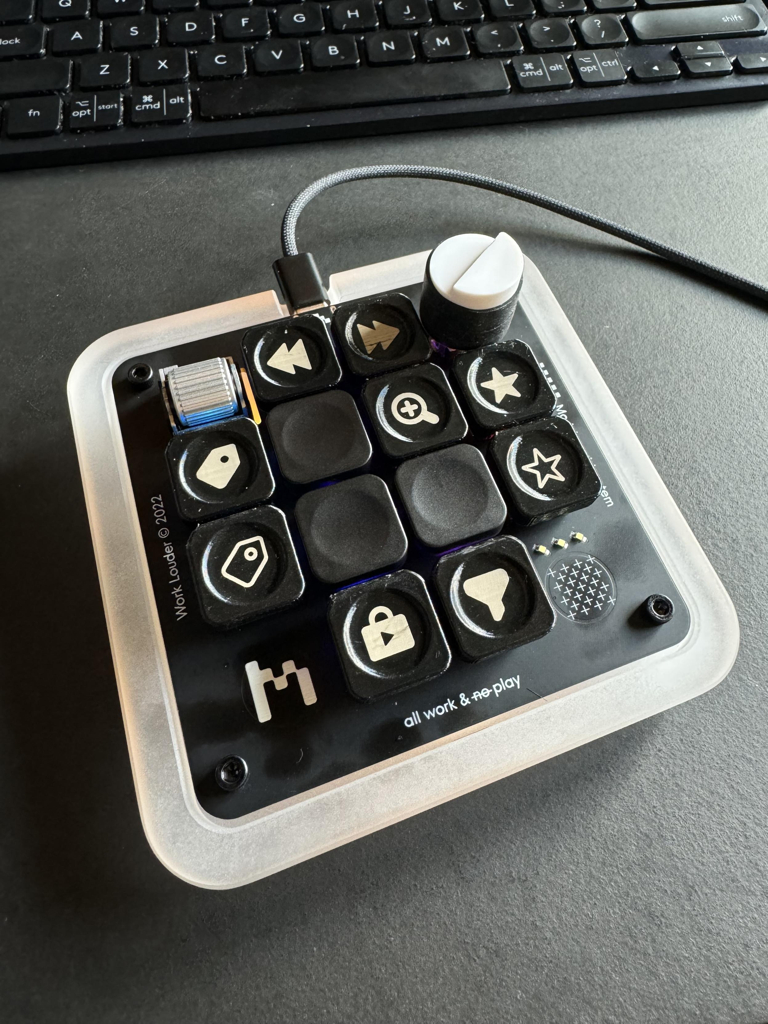 A Work Louder USB pad with custom printed shortcut buttons for rating, filtering, locking jumps, and zooming in ShutterSnitch.